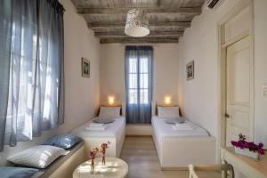 Cama ou camas em um quarto em Olia Hotel