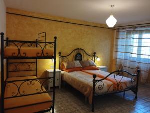 Letto o letti in una camera di Alloggio Agrituristico Abruzzomio - Casa Somarello