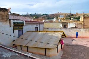 a view of a building with a roof at Riad Rajy in Fez