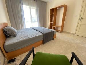 Postel nebo postele na pokoji v ubytování Your Comfortable Home + 11 fotografií