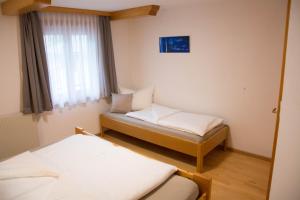 Posteľ alebo postele v izbe v ubytovaní Ferienhaus Mühlstein