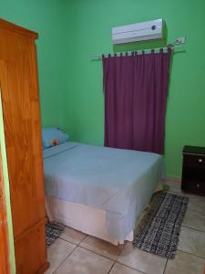 Una cama o camas en una habitación de Iguazu...mi lugar en el ?