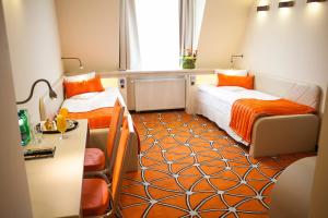 Ένα ή περισσότερα κρεβάτια σε δωμάτιο στο Hotel Eclipse