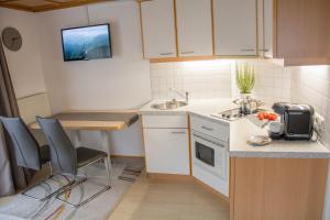 Kuchyňa alebo kuchynka v ubytovaní Ferienhaus Mühlstein