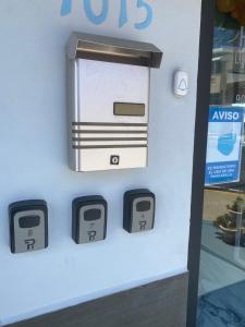 an atm machine on a wall in a store at Itza-Bella Suites in Isabela