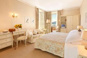 Ліжко або ліжка в номері Hotel Tamaro
