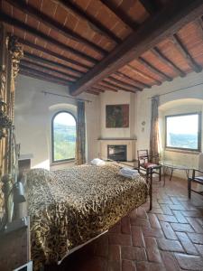 Postel nebo postele na pokoji v ubytování Poggio Alla Pieve Relais