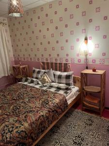 Ένα ή περισσότερα κρεβάτια σε δωμάτιο στο Cosy Appartment. Püssi town