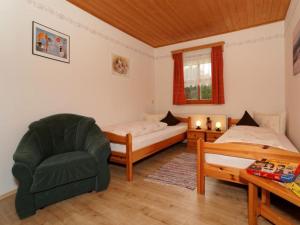 Postel nebo postele na pokoji v ubytování Ferienhaus Hütter