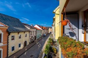 a view of a city street with buildings at Apartmán Strieborná v centre mesta in Banská Bystrica