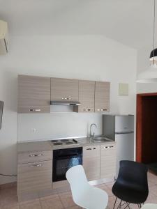 Ett kök eller pentry på Apartmani Vesna