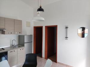 Kuchyň nebo kuchyňský kout v ubytování Apartmani Vesna