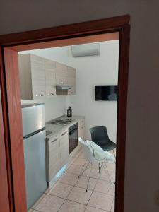 Kuchyň nebo kuchyňský kout v ubytování Apartmani Vesna