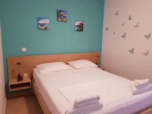 Un ou plusieurs lits dans un hébergement de l'établissement Corfu Dream Holidays Villas