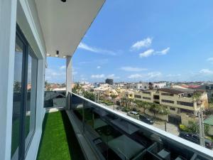 a balcony with a view of a city at Romel Terraces in Lagos