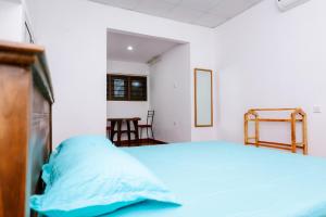 Postel nebo postele na pokoji v ubytování Savenndra Hotel