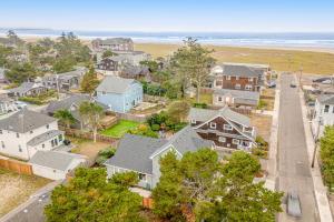 an aerial view of a neighborhood with houses and the beach at Seaside Ocean Getaway in Seaside