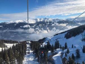 Ferienhaus Zillertal Panorama Blick Balkon Sauna v zimě