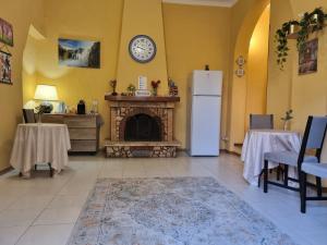 Kuchyň nebo kuchyňský kout v ubytování Rose Guest House