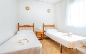 Posteľ alebo postele v izbe v ubytovaní Stunning Apartment In Torrevieja