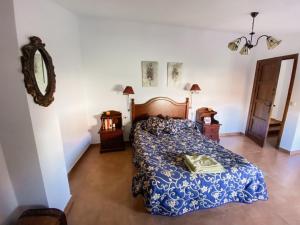Säng eller sängar i ett rum på Villaestanque