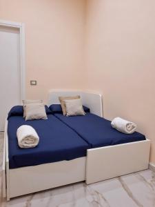 Posteľ alebo postele v izbe v ubytovaní Re Ferdinando Apartment