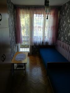 Posteľ alebo postele v izbe v ubytovaní Krisztina apartman