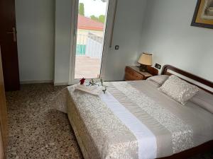 Posteľ alebo postele v izbe v ubytovaní Casa la Pineda Salou, playa y Port Aventura