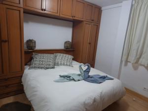Postel nebo postele na pokoji v ubytování EDIFICO BULGARIA CON GARAJE