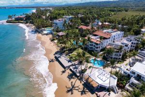 an aerial view of a resort and the beach at Todo Bien Panoramic views 2 DECKS closest to sand in Cabarete