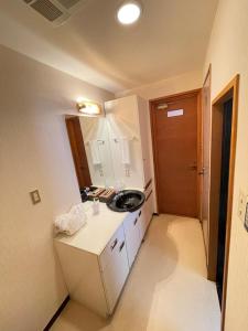 A bathroom at Cottage Hotel Fenice Hakuba