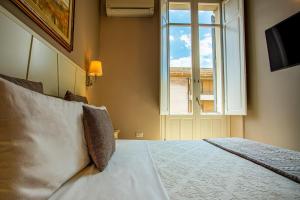 Posteľ alebo postele v izbe v ubytovaní Marlin Rooms