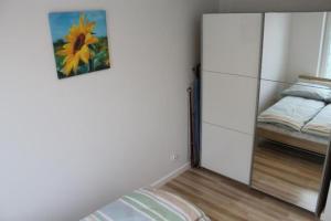 Posteľ alebo postele v izbe v ubytovaní Apartament Vanessa w centrum 600 m od morza