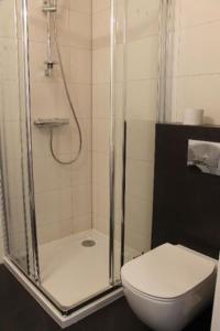 Kúpeľňa v ubytovaní Apartament Vanessa w centrum 600 m od morza + 11 fotografií