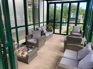Posezení v ubytování Hotel La Quercia