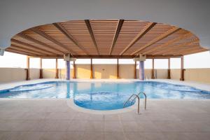 Sundlaugin á La Maison Hotel Doha eða í nágrenninu
