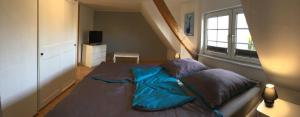 Postel nebo postele na pokoji v ubytování Schöne Große Wohnung, Terrasse, Kamin, Parkplatz, 2 Schlafzimmer