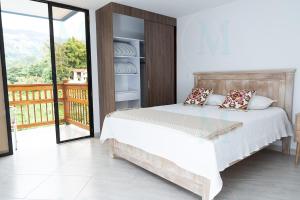 Postel nebo postele na pokoji v ubytování La Casa de Ana 2