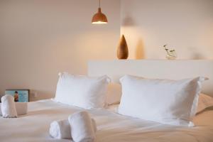 Кровать или кровати в номере VILLA FLAKA Boutique Hôtel Confidentiel et Convivial