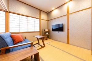 Una televisión o centro de entretenimiento en Yuimaru EAST - 最大18名貸切OK