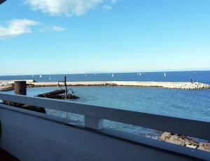 a view of the ocean from a balcony at Fronte mare in Castelsardo +5 photos