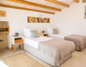 Postel nebo postele na pokoji v ubytování ArtHill eco villas