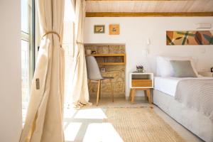 Postel nebo postele na pokoji v ubytování ArtHill eco villas