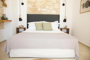 Postel nebo postele na pokoji v ubytování ArtHill eco villas