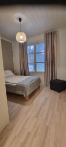 Ένα ή περισσότερα κρεβάτια σε δωμάτιο στο Apartment Louna