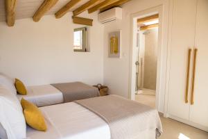 Postel nebo postele na pokoji v ubytování ArtHill eco villas