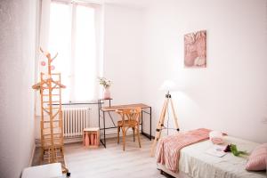 Posteľ alebo postele v izbe v ubytovaní Douce Parenthese a Carcassonne