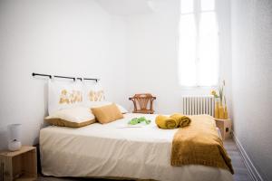 Posteľ alebo postele v izbe v ubytovaní Douce Parenthese a Carcassonne