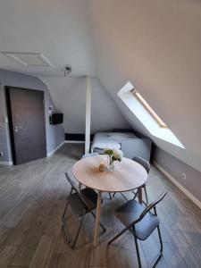 Posezení v ubytování Studio de la Demi Lune