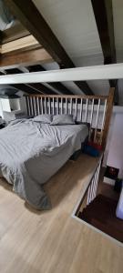 a bed in the middle of a room at APART-SKY A PIE DE PISTAS PARA 6PERSONAS - LA MOLINA ESTACIÓN in La Molina